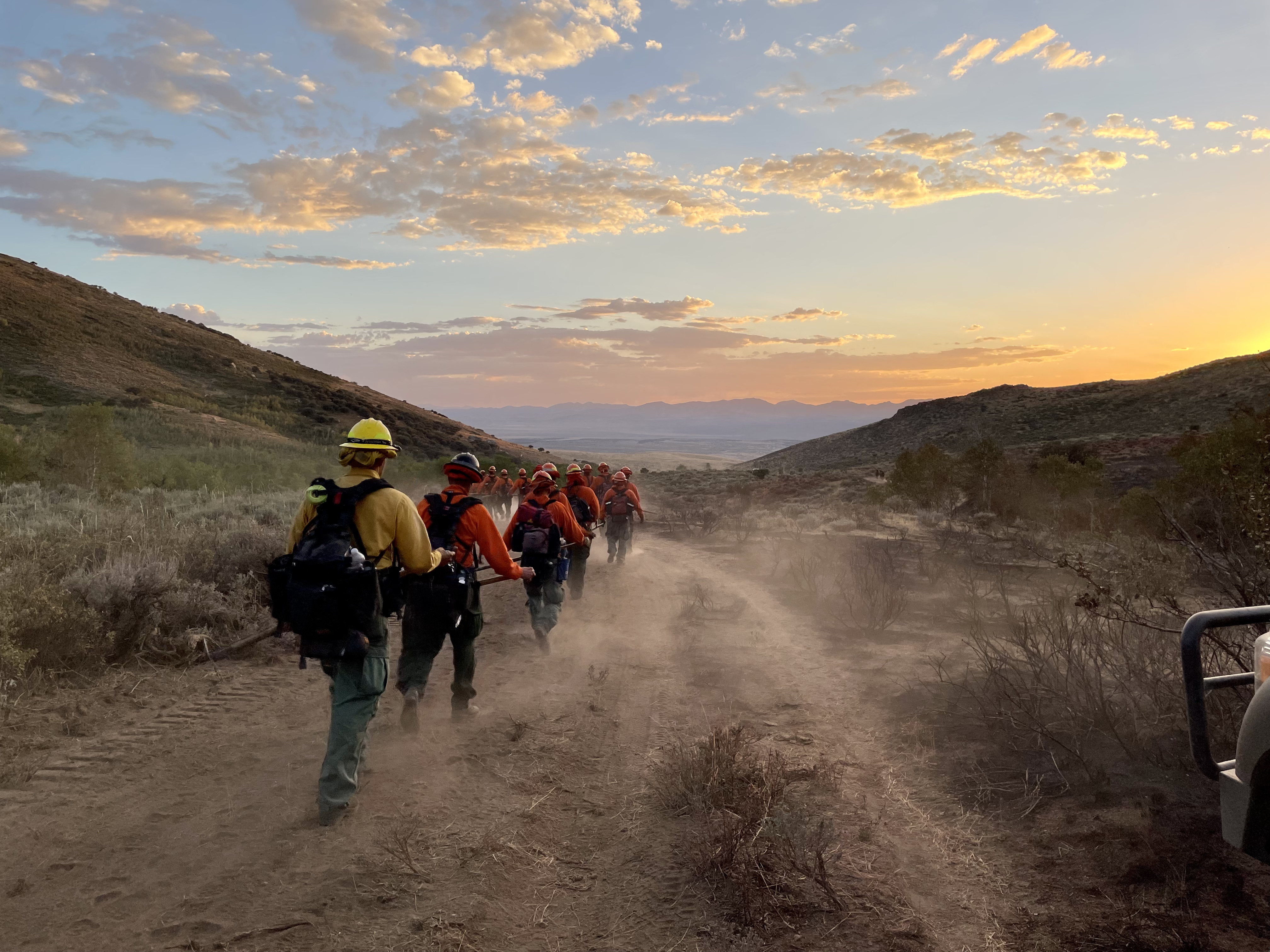 Photo by Kate Milch (BLM) of a fire crew hiking to their base camp